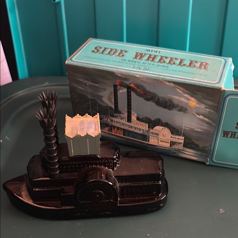 Vintage Avon Side Wheeler bottle